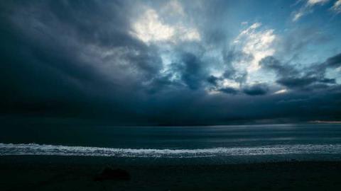 Storm clouds over a dark sea